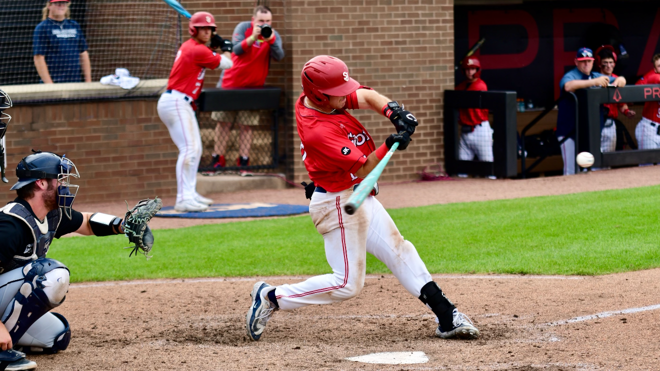 Ben Beauchamp making contact at the plate for St. John's
